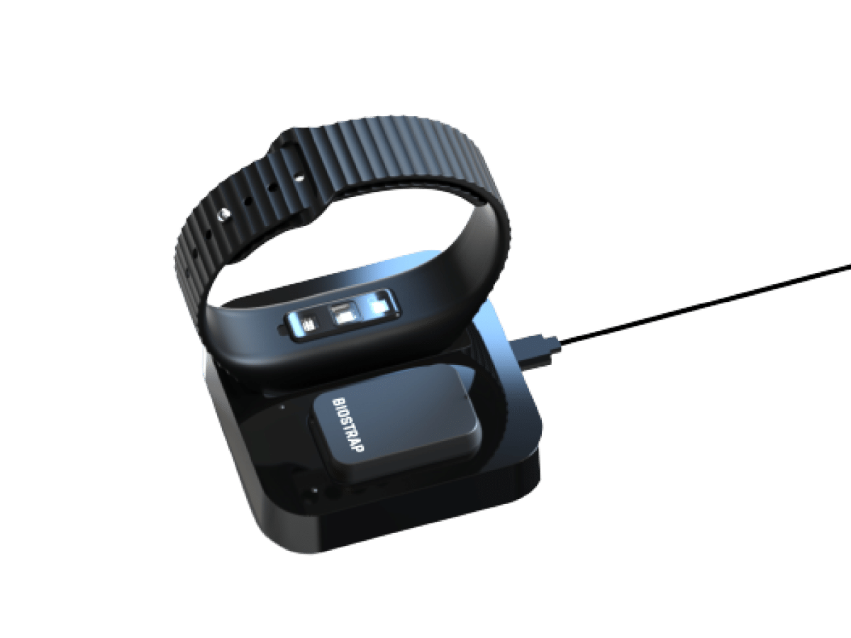 Biostrap EVO screenless sensor resting on its charging dock