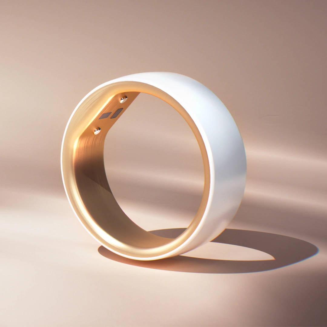 Femometer Smart Ring Gen2 with a white ceramic exterior and gold interior
